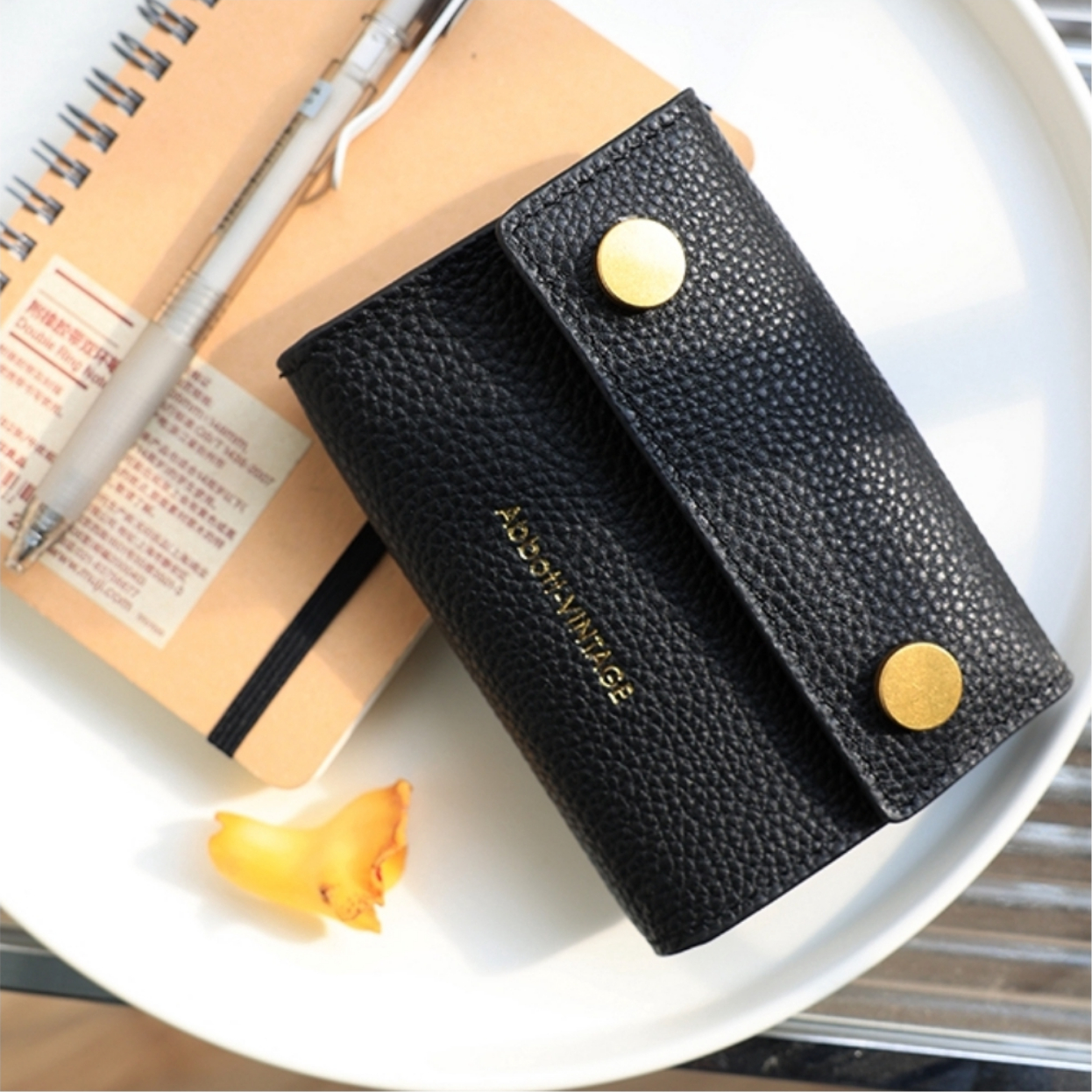 推荐商品：Abbott Vintage 复古纯色头层牛皮零钱手拿包