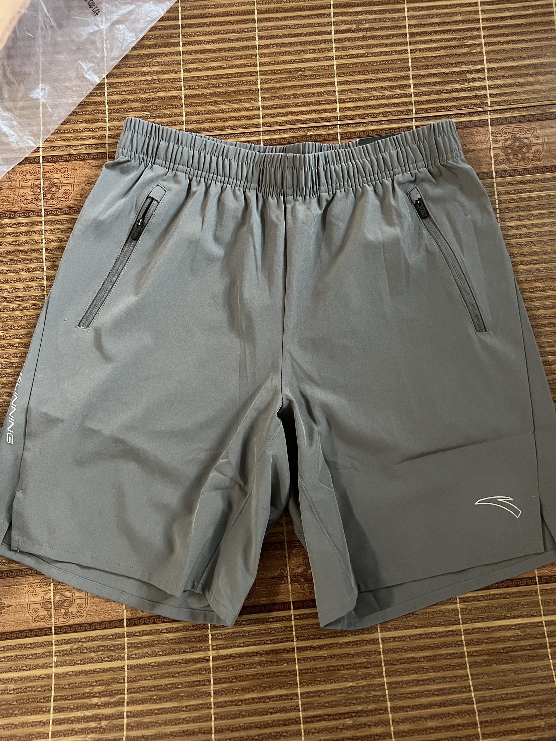 安踏速干梭织短裤