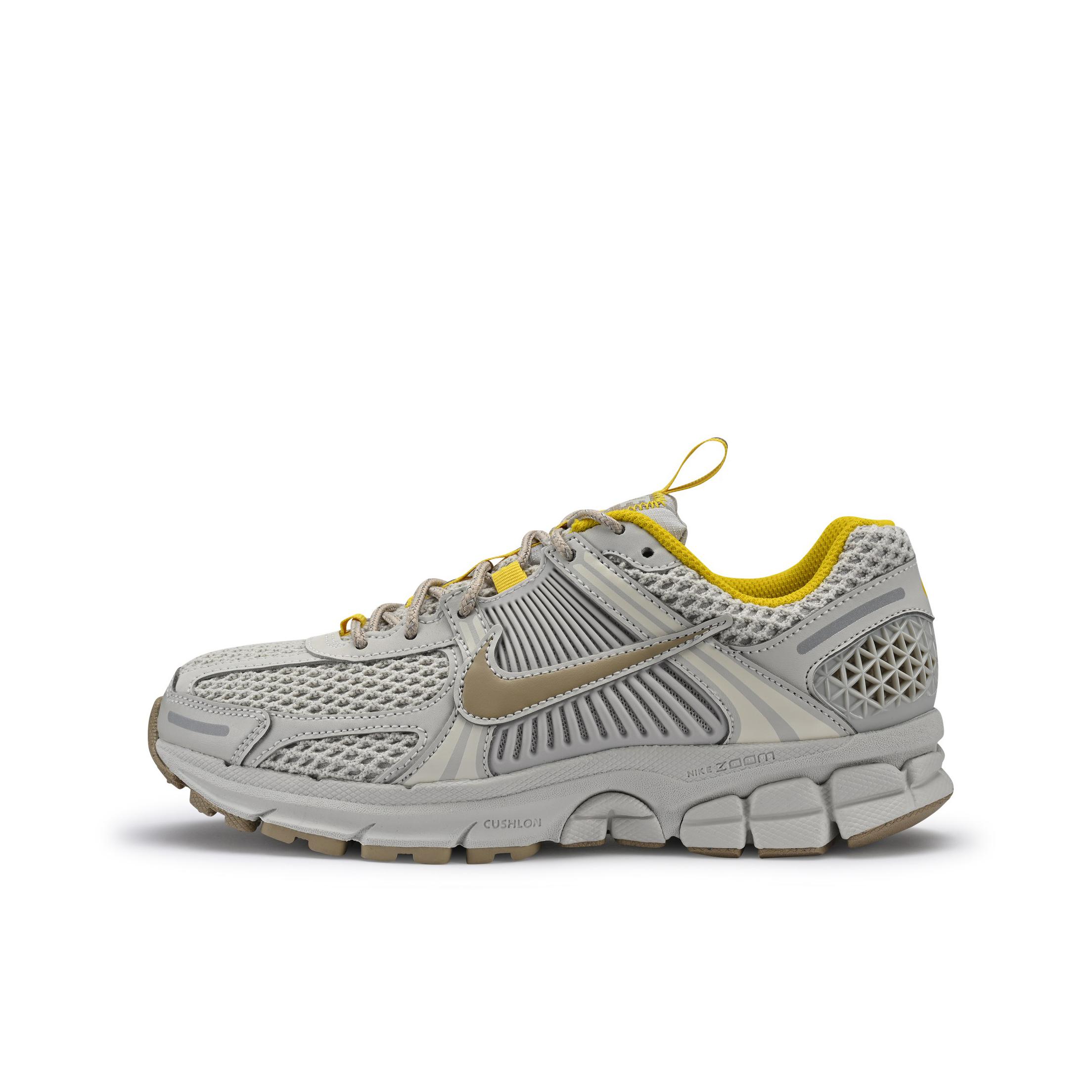 推荐商品：Nike Zoom Vomero 5 跑鞋 舒适缓震网面透气百搭复古支撑训练轻便 浅骨色/石灰色