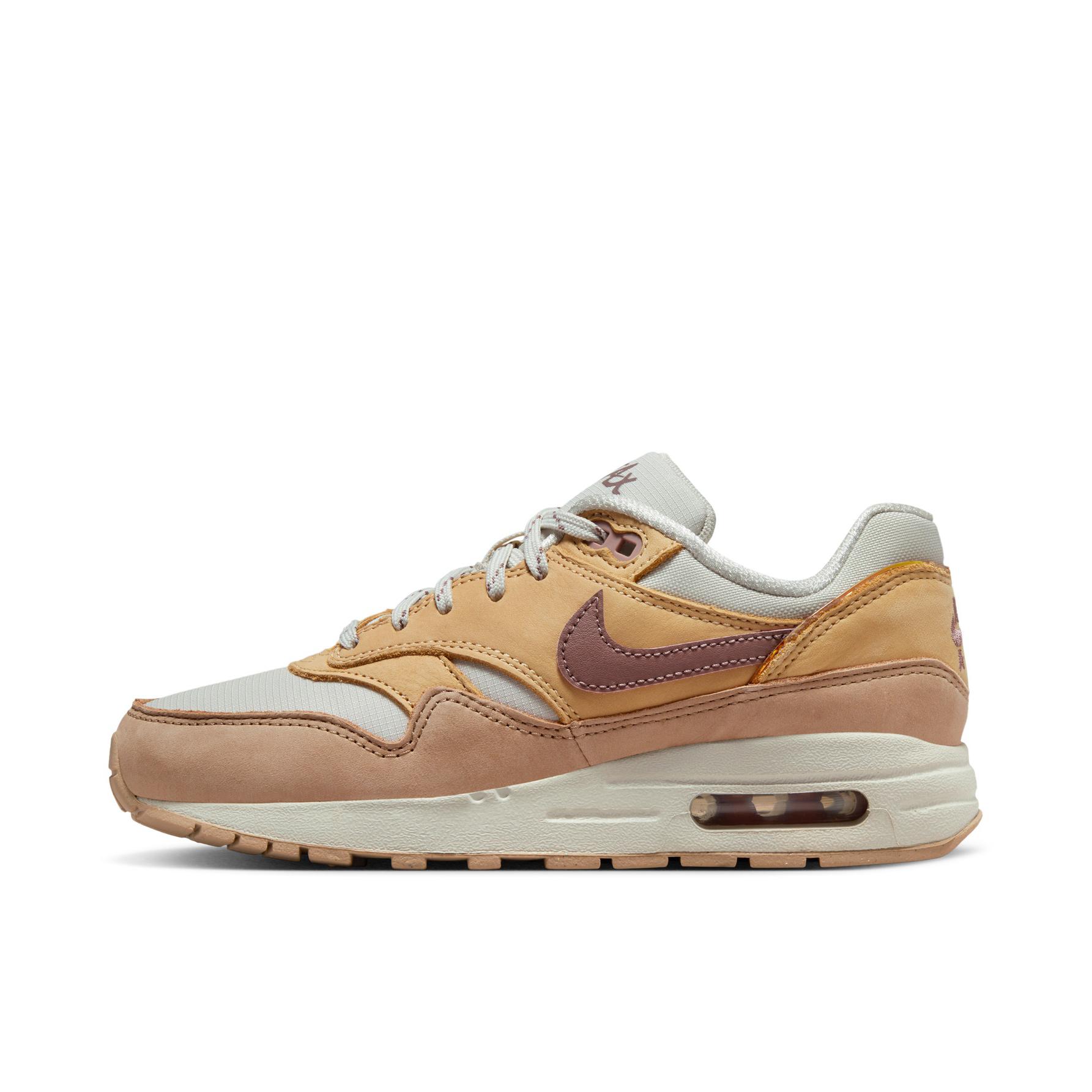 推荐商品：Nike Air Max 1 跑鞋 气垫缓震透气轻便复古运动舒适百搭潮流耐磨低帮训练防滑冬季支撑马拉松防水抓地圆头耐穿 女款/浅骨色/麻黄/烟灰紫红