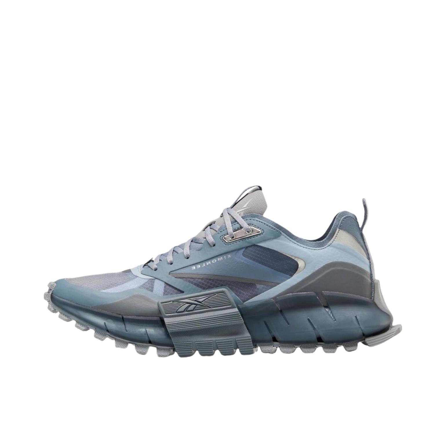 推荐商品：Reebok/锐步 Zig Kinetica Edge 运动休闲鞋 时尚复古防滑耐磨减震轻便网布合成革织物舒适 Ximonlee联名/冰蓝/灰色