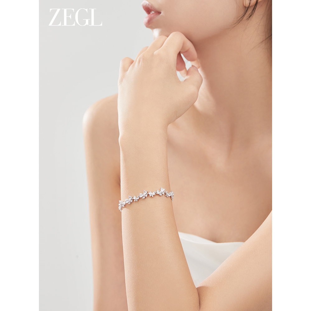 推荐商品：ZENGLIU/ZEGL 紫藤花微笑满钻锆石手链 WS46096