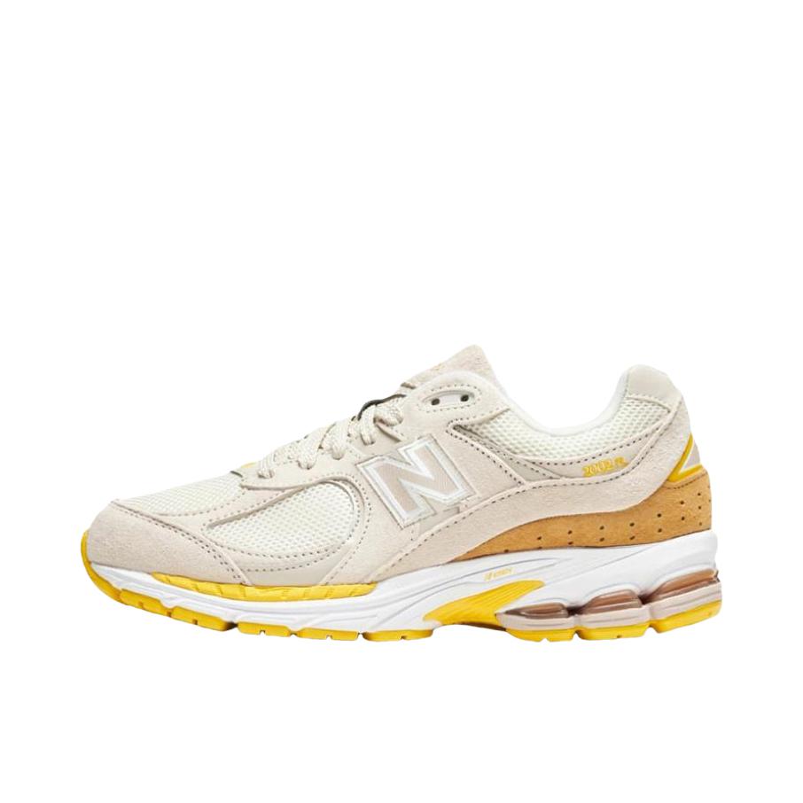 推荐商品：New Balance 2002R 跑鞋 缓震防滑耐磨透气复古拼接防水气垫慢跑支撑 B宽/女款/米色/黄色