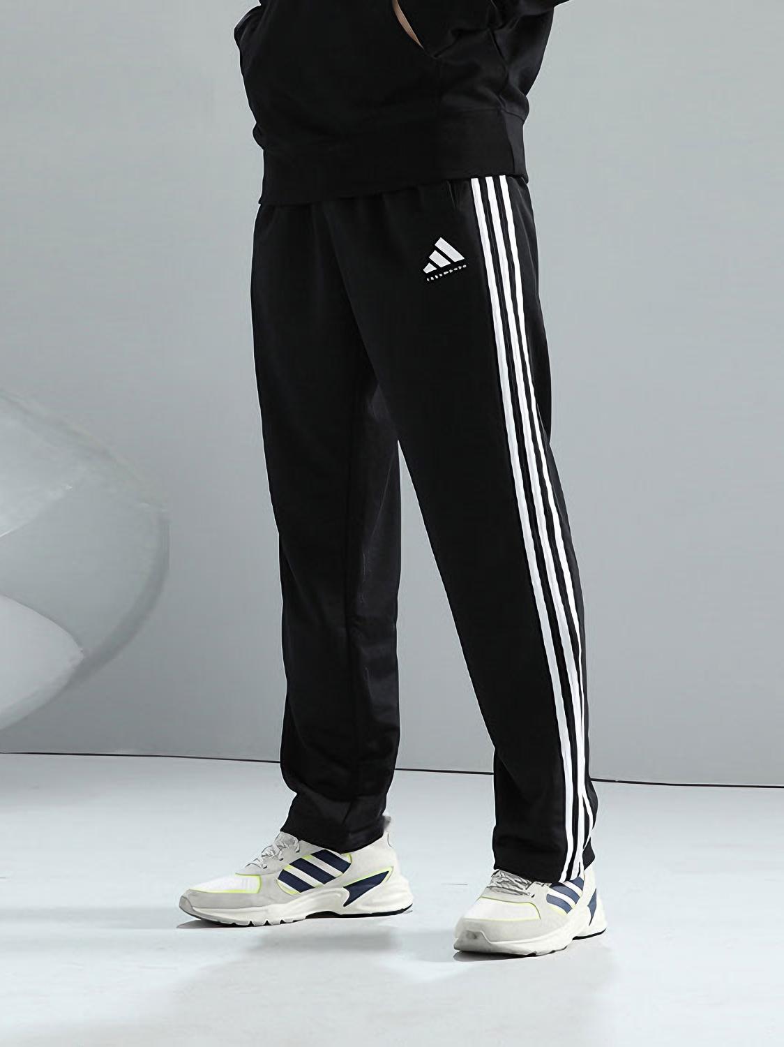 推荐商品：adidas/阿迪达斯 武极 三条纹平口防风松紧透气中腰收口直筒运动长裤 黑