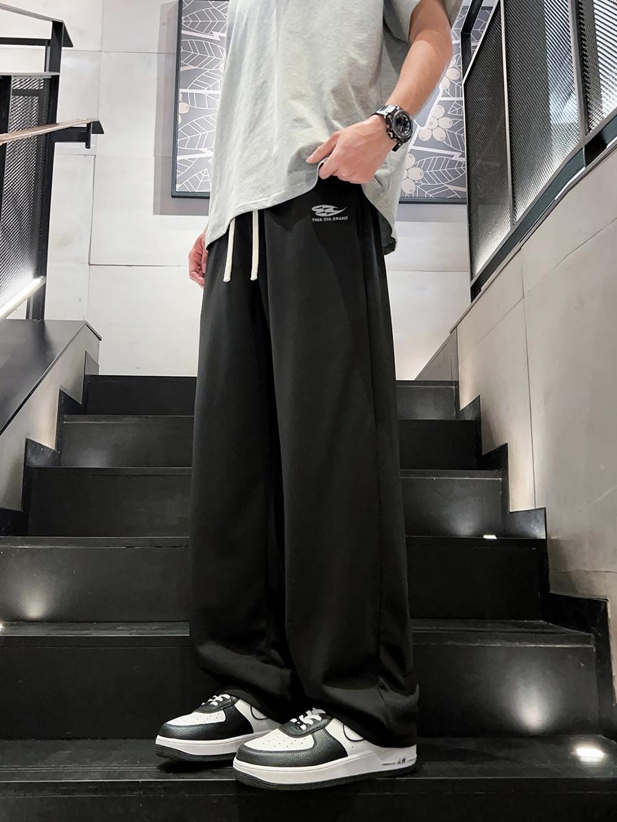 推荐商品：TINA GIA SS25 美式系带阔腿垂感运动长裤 SS2501T43 黑