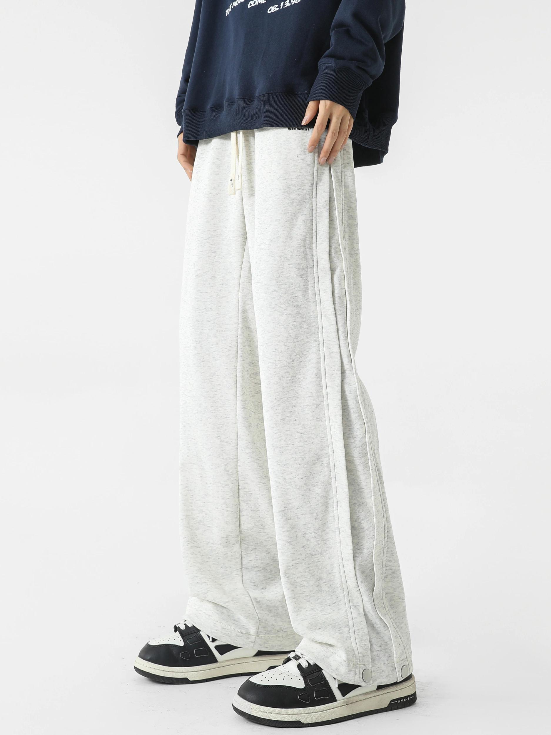 推荐商品：P8H9 字母系列侧边拼接系带直筒运动长裤 PP-ZJH-A478CX02 白灰/黑