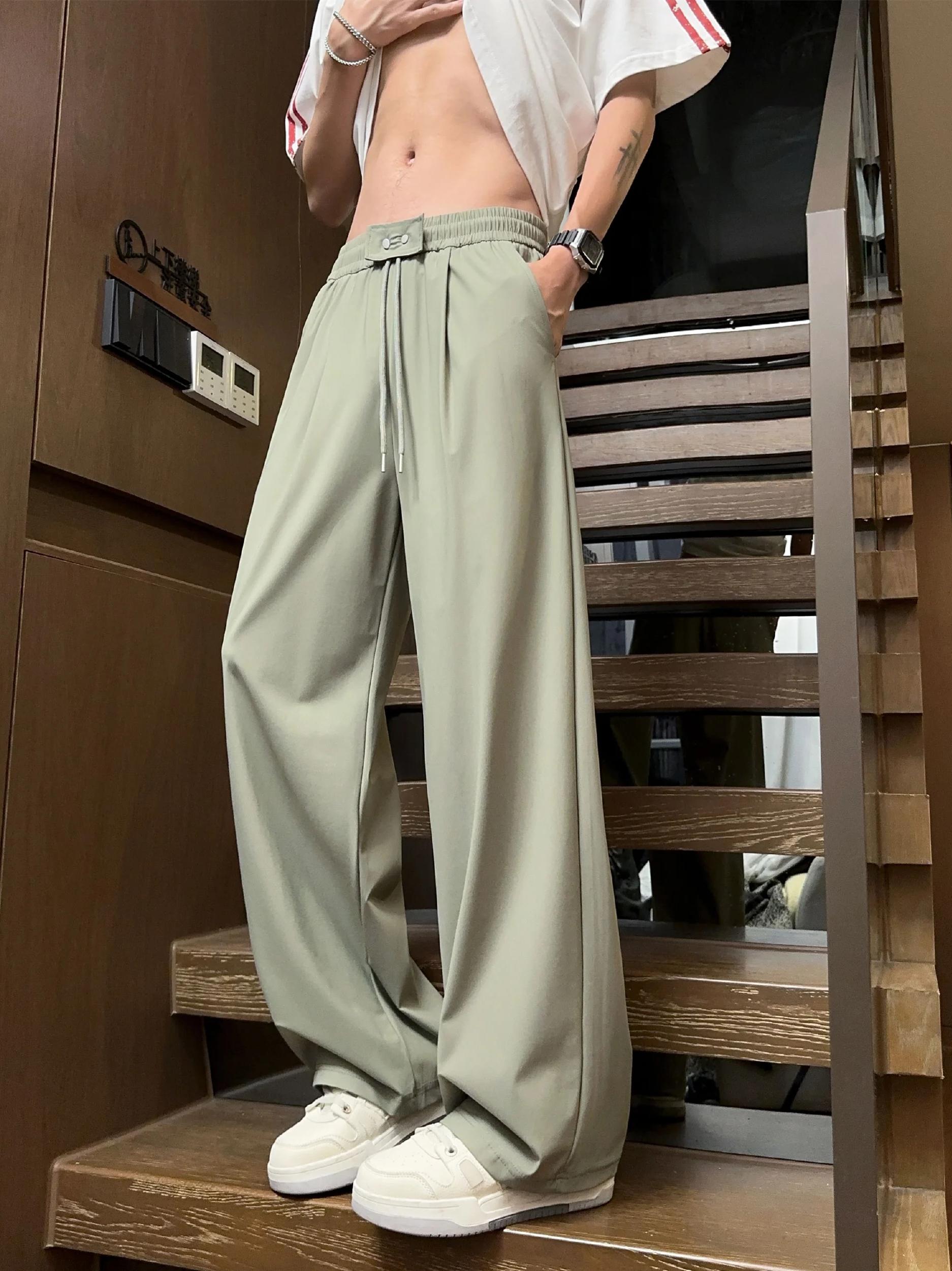 推荐商品：NXNM 纯色抽绳针织运动长裤 NXZ-C2398 茶