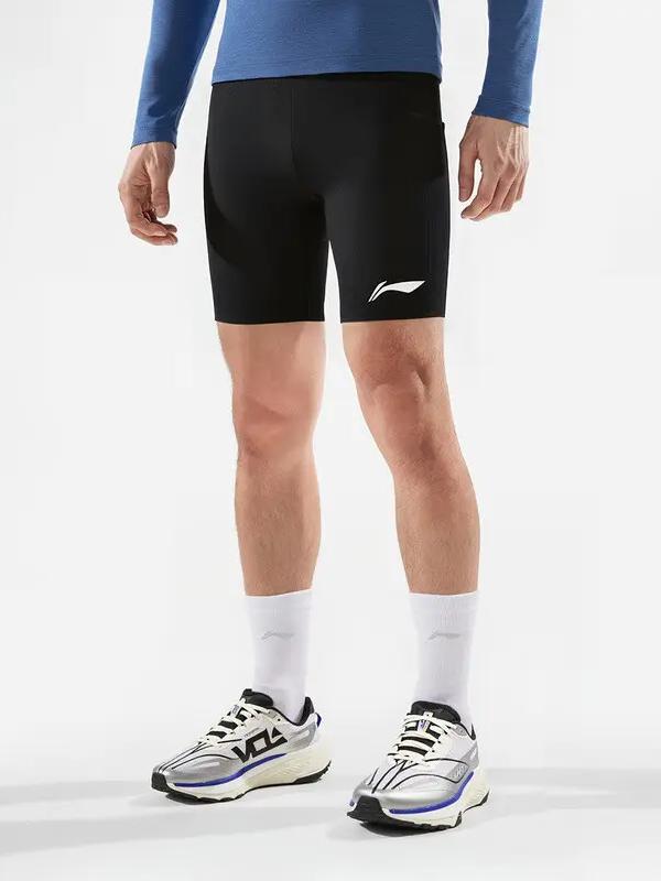 推荐商品：【大迫杰同款】Li Ning/李宁 龙雀系带中腰拼接排湿速干冰感凉爽五分紧身裤 AUSV003 黑
