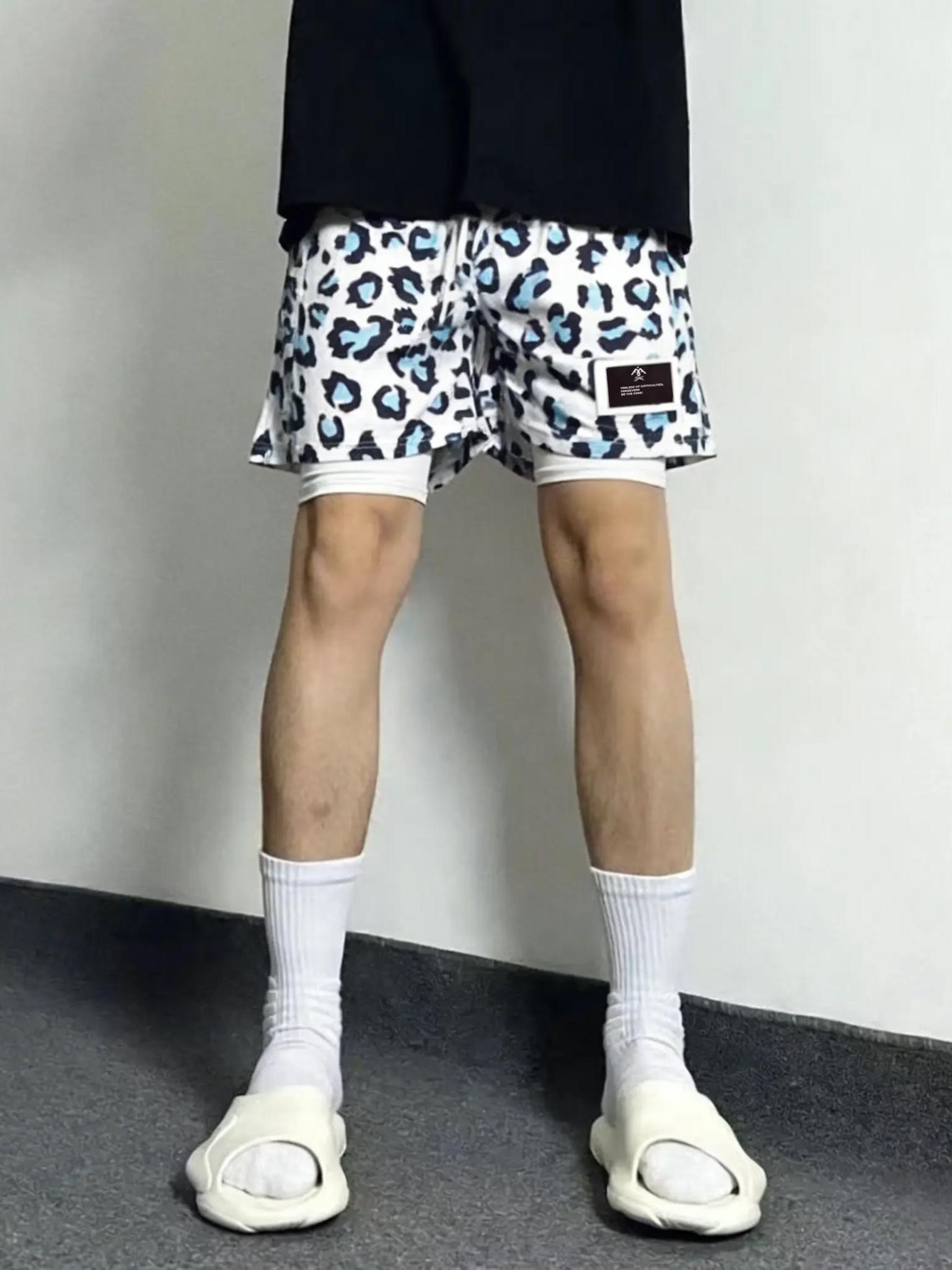 推荐商品：FFOMKE 2026SS 直筒满印迷彩豹纹运动短裤 NZ-FFTYDK4dk03 白蓝