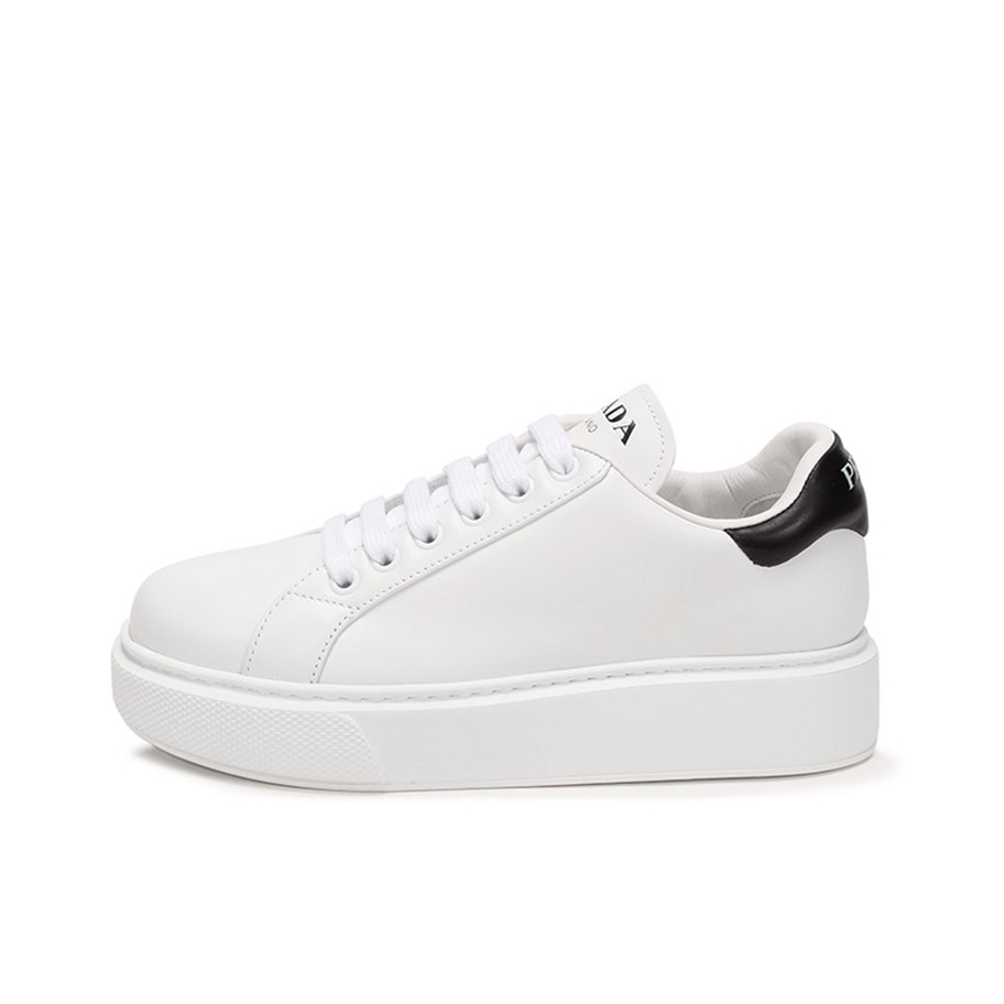 推荐商品：Prada 厚底 休闲运动 时尚百搭 板鞋 1E892L3J8K 白色/黑尾