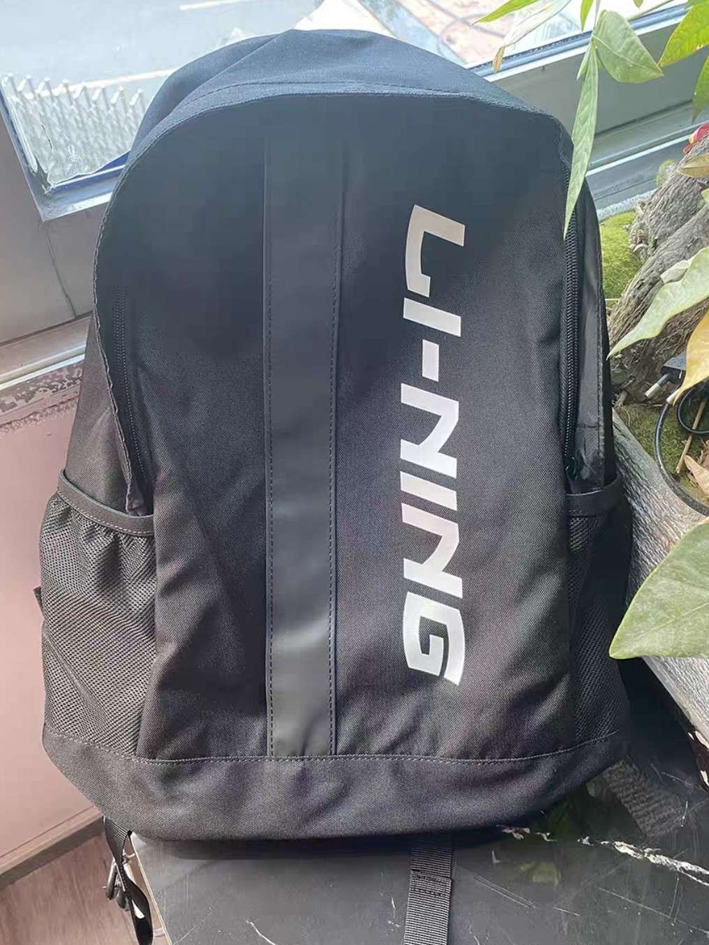 李宁的双肩包