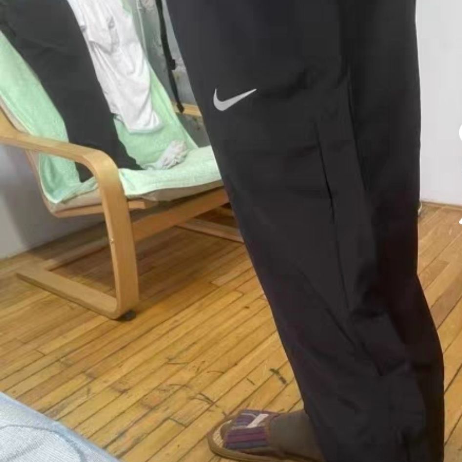 Nike 透气梭织跑步长裤 