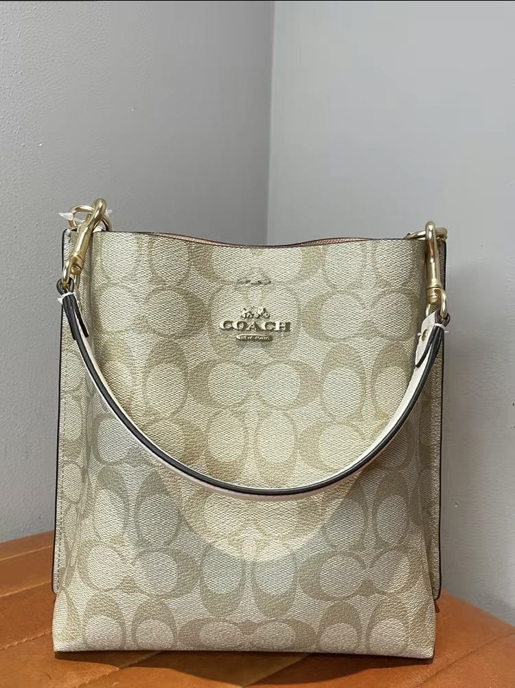 Coach Mollie 22 小号 经典老花涂层帆布拼皮 手提水桶包单肩斜挎包