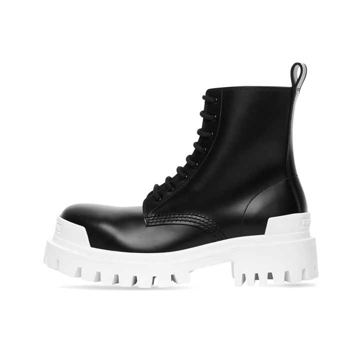 推荐商品：Balenciaga 简约时尚 短筒 厚底 时装靴670632 WBCP1 100 黑色/白色