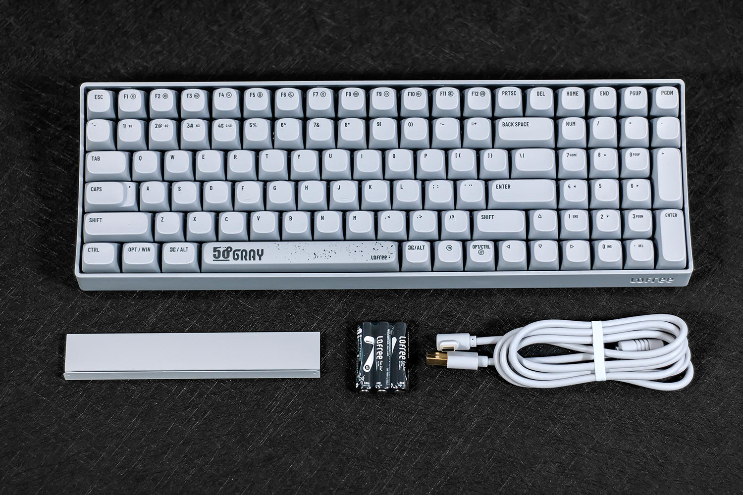 不止于弧线造型,还有紧凑高效的布局,洛斐小翘水泥灰机械键盘