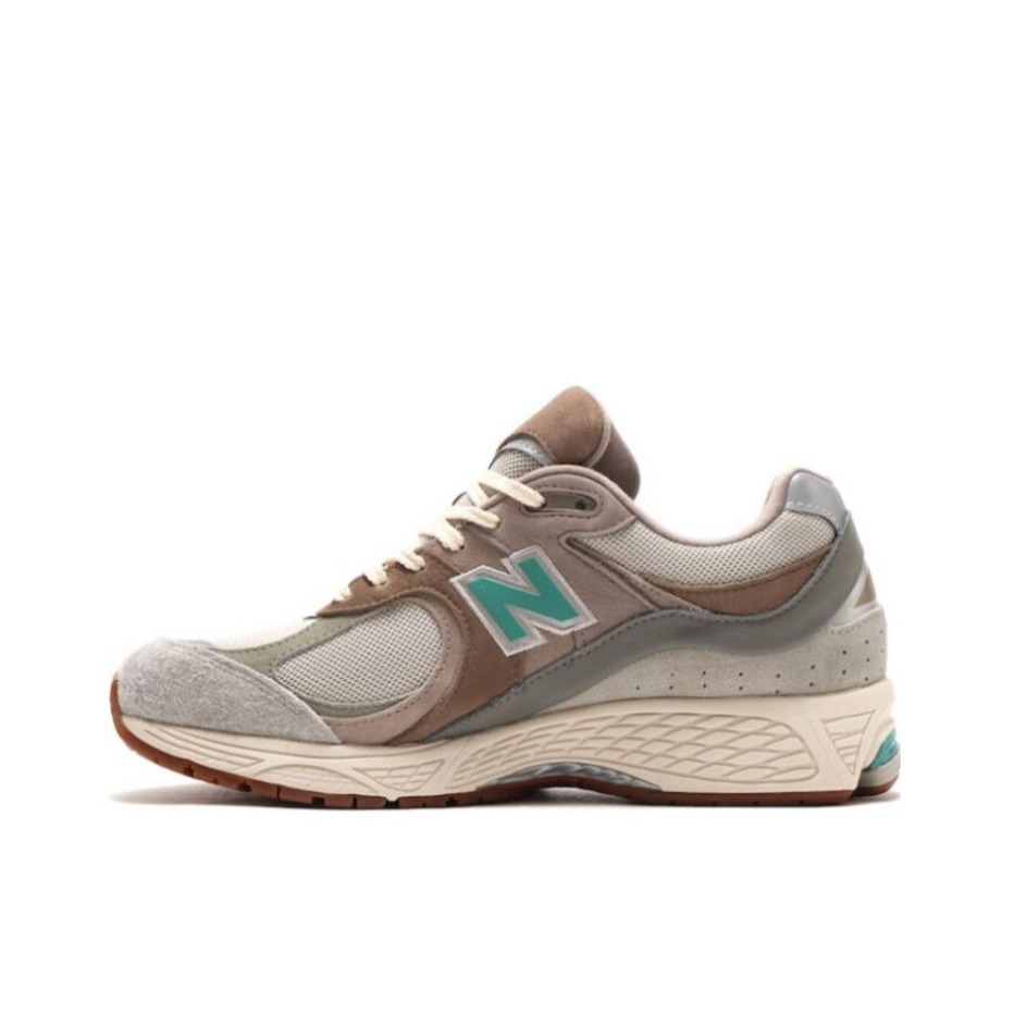 推荐商品：New Balance 2002R 跑鞋 缓震防滑耐磨透气复古拼接防水气垫慢跑支撑 Oasis Atmos联名/米色/棕色/绿色 