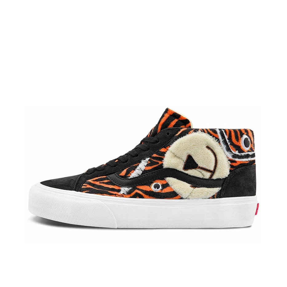 推荐商品：Vans/范斯 Mid Skool 板鞋 潮流百搭防滑耐磨舒适透气轻便 黑白/虎纹