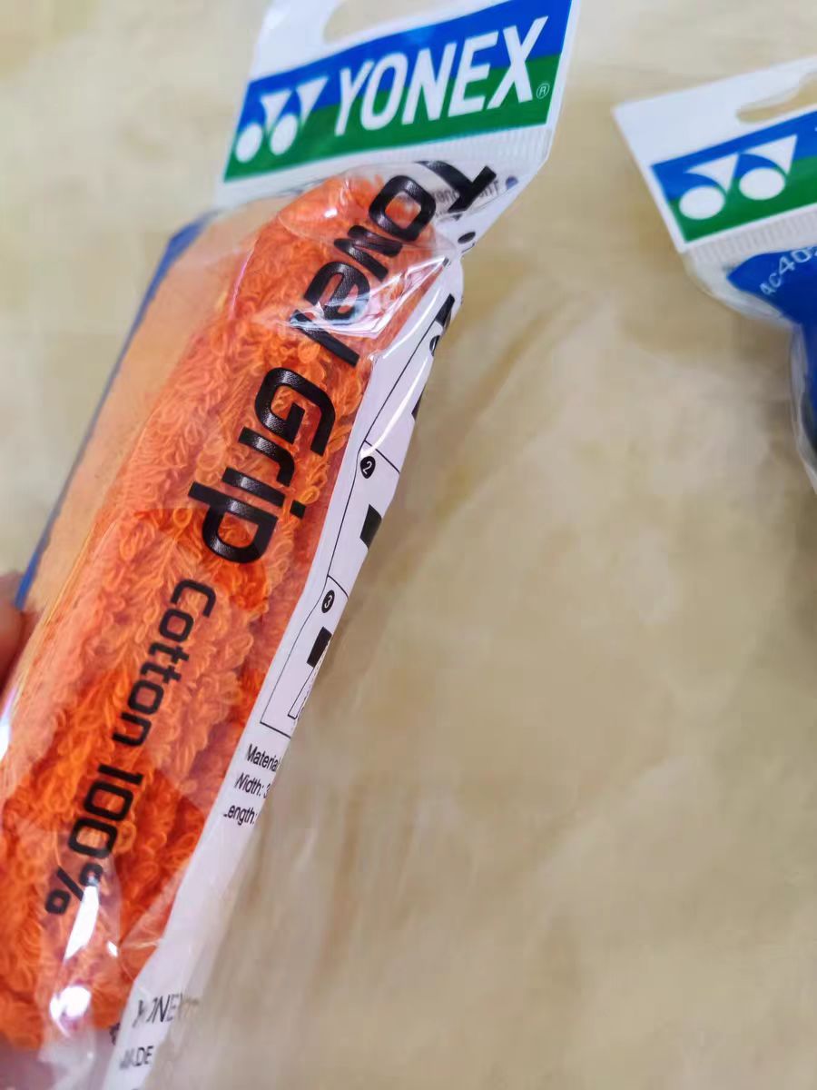 桔色羽毛球拍手胶，让我成为球场上的亮丽风景线！